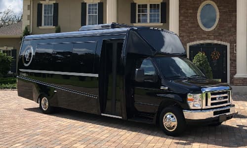 A black Olympus minibus